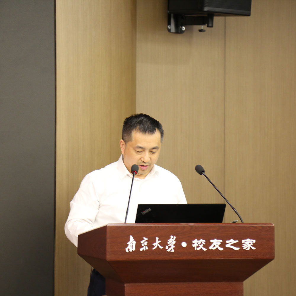 Prof Dhou Dongshan at the lecturn, opening the symposium