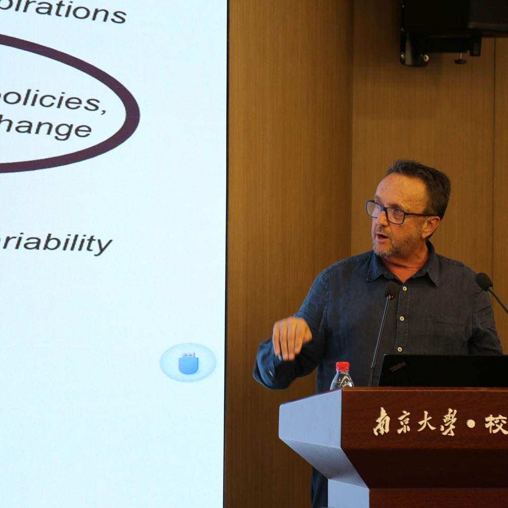 Prof Damian Hine making a point