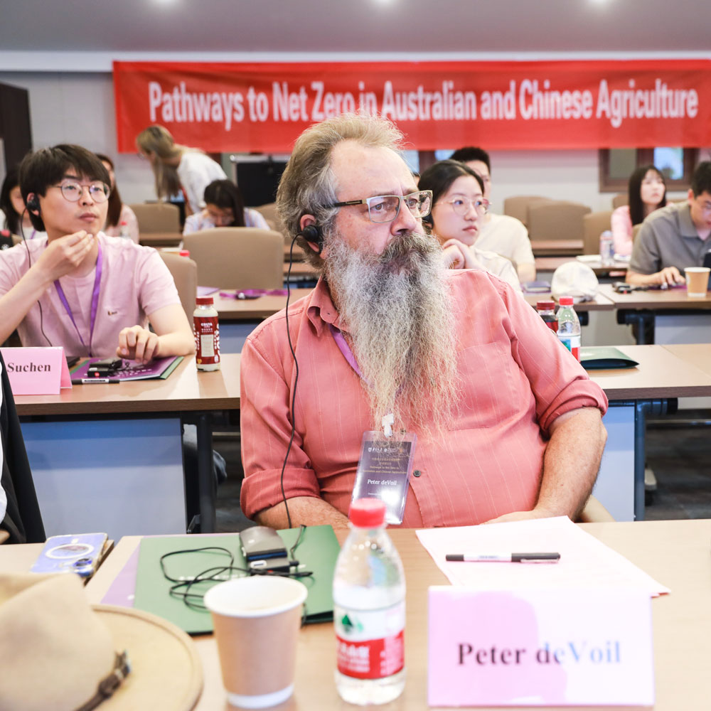 Peter DeVoil listening to the presentations