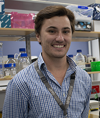 Headshot of Harry Lamb in a lab setting 