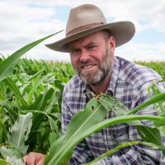 Head shot of Joe Eyre in a field of shredded crops. Image: Megan Pope