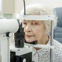 Elderly lady getting eye test