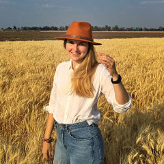 Charlotte Rambla in a field of crops